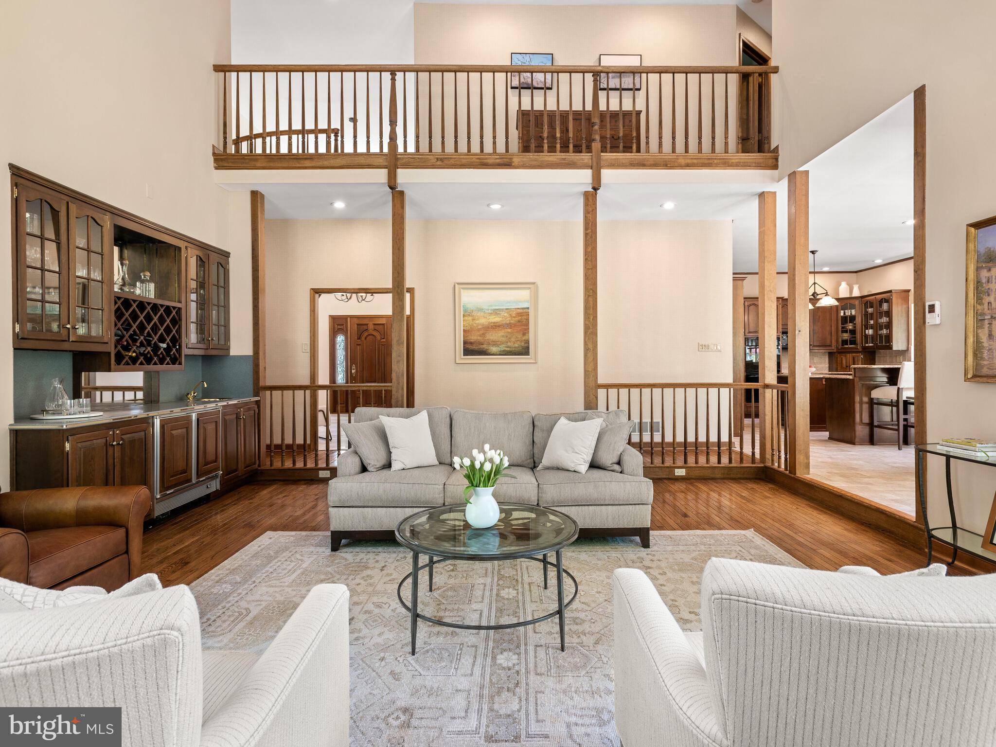 673 Thomas Jefferson Road Wayne, PA 19087 - Photo 12 of 64 a living room with furniture and a flat screen tv