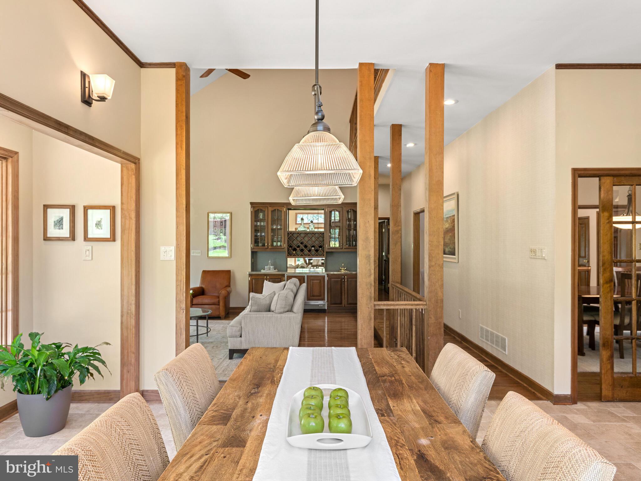 673 Thomas Jefferson Road Wayne, PA 19087 - Photo 14 of 64 a living room with furniture and a chandelier