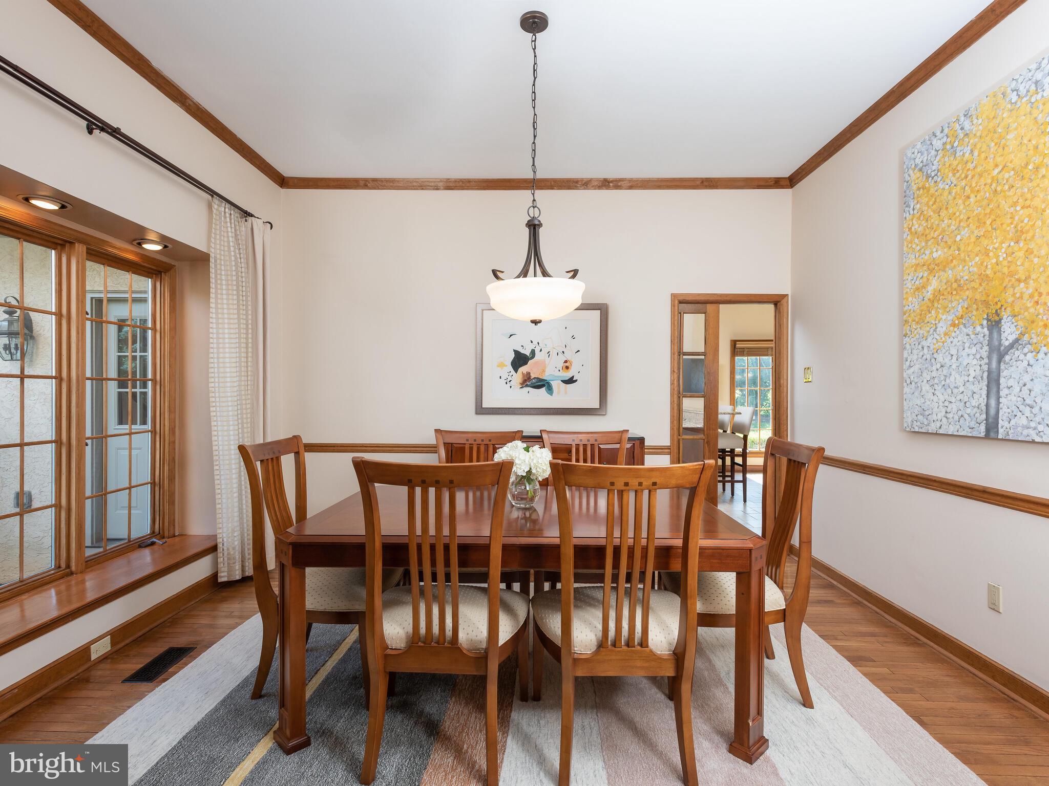 673 Thomas Jefferson Road Wayne, PA 19087 - Photo 24 of 64 a view of a dining room with furniture window and wooden floor