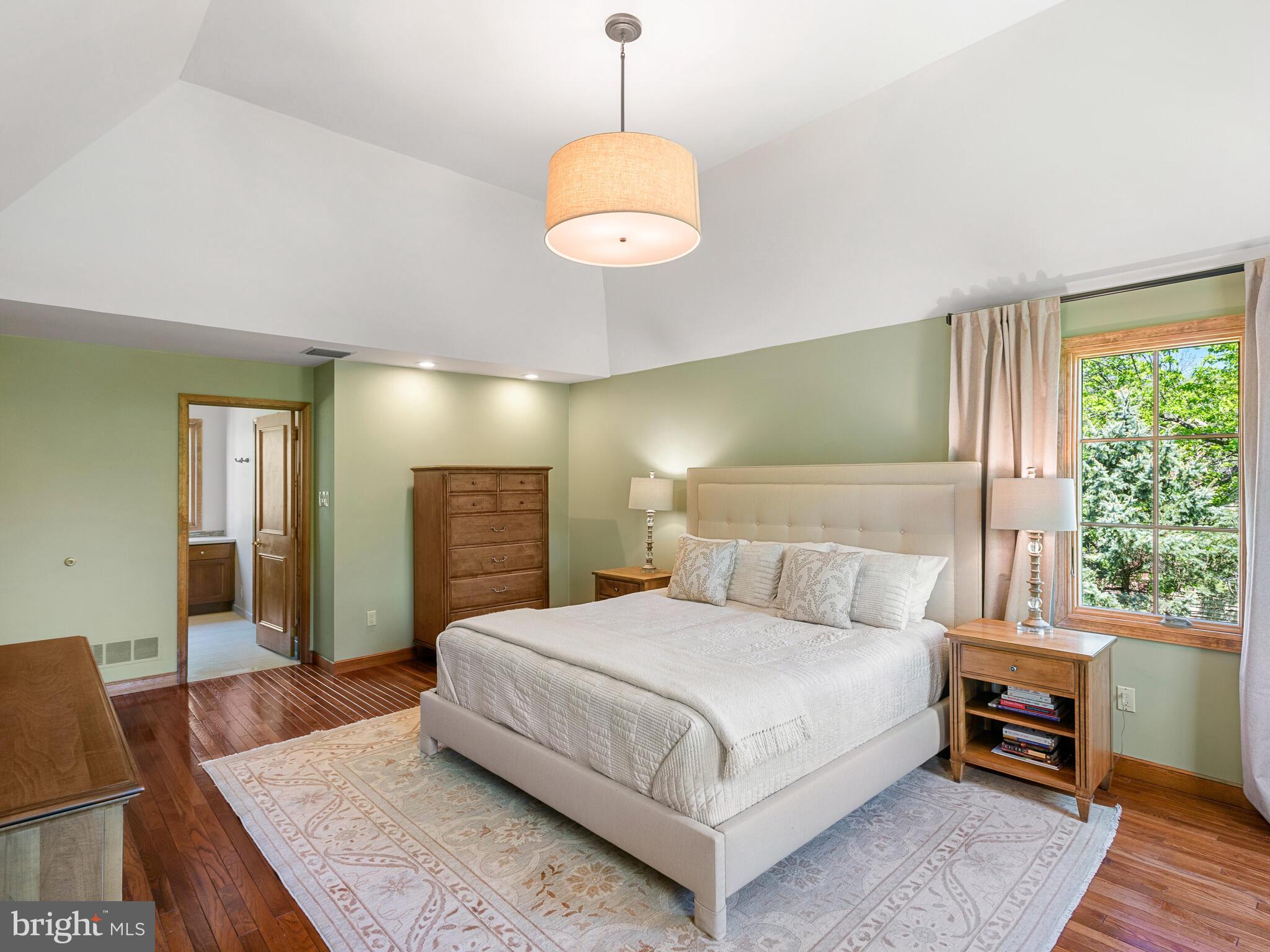 673 Thomas Jefferson Road Wayne, PA 19087 - Photo 31 of 64 a bedroom with a bed and wooden floor