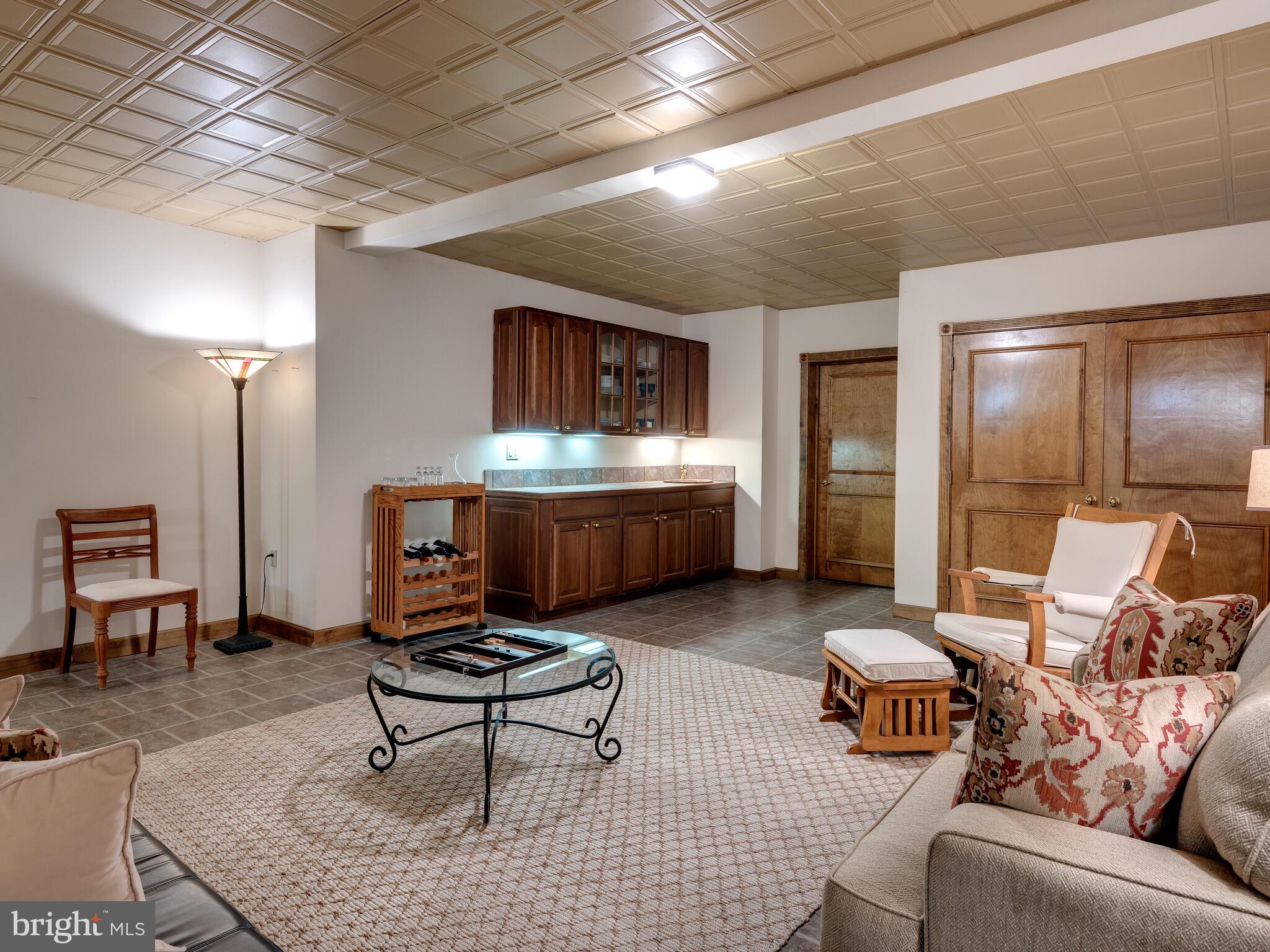 673 Thomas Jefferson Road Wayne, PA 19087 - Photo 43 of 64 a living room with furniture and a wooden floor