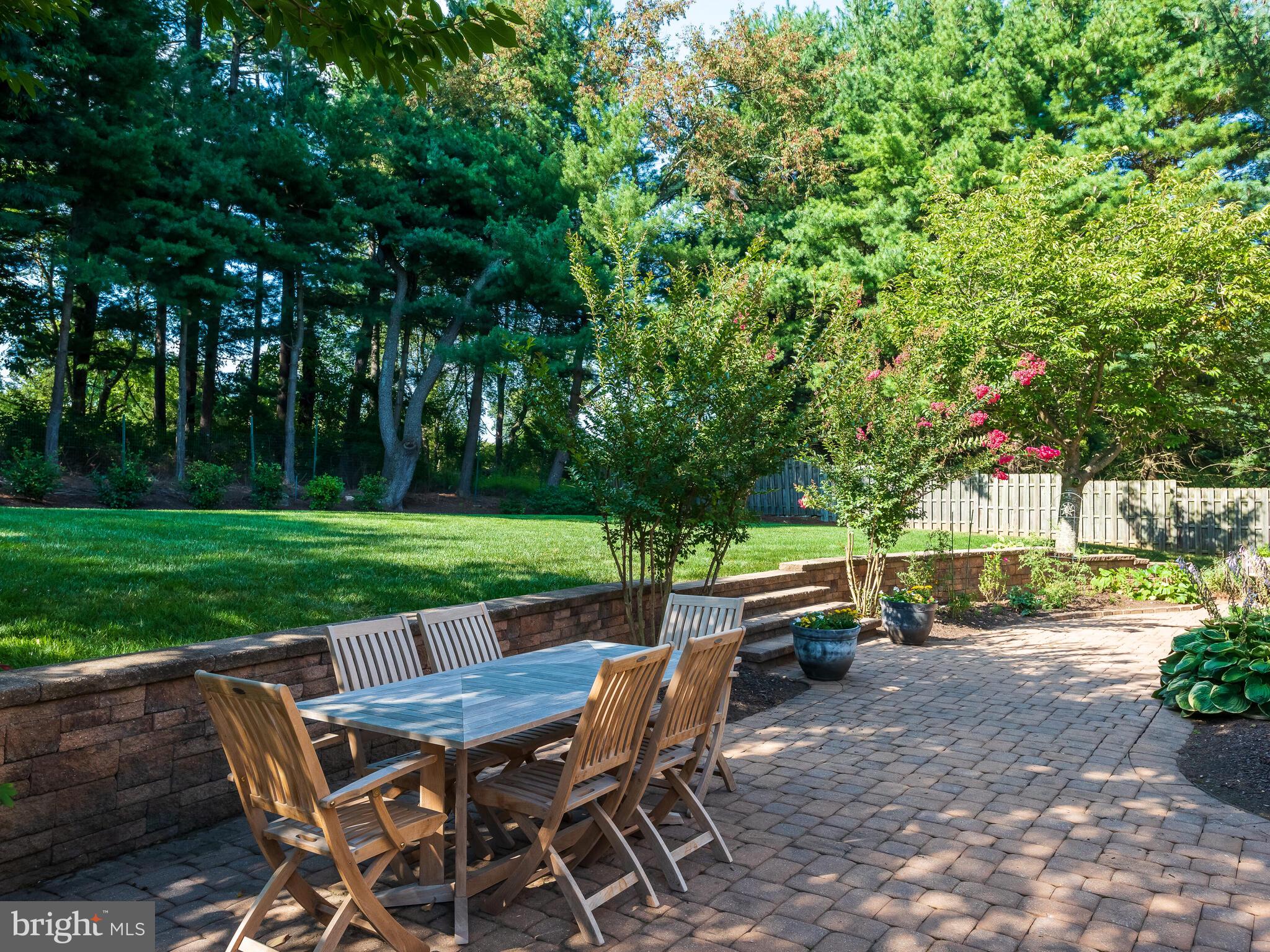 673 Thomas Jefferson Road Wayne, PA 19087 - Photo 48 of 64 a view of a backyard with sitting area