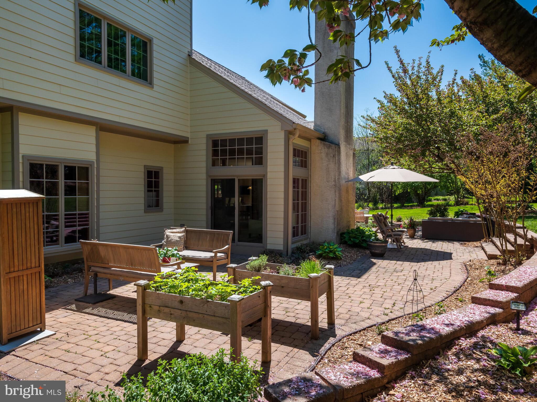 673 Thomas Jefferson Road Wayne, PA 19087 - Photo 49 of 64 a view of a house with backyard and sitting area
