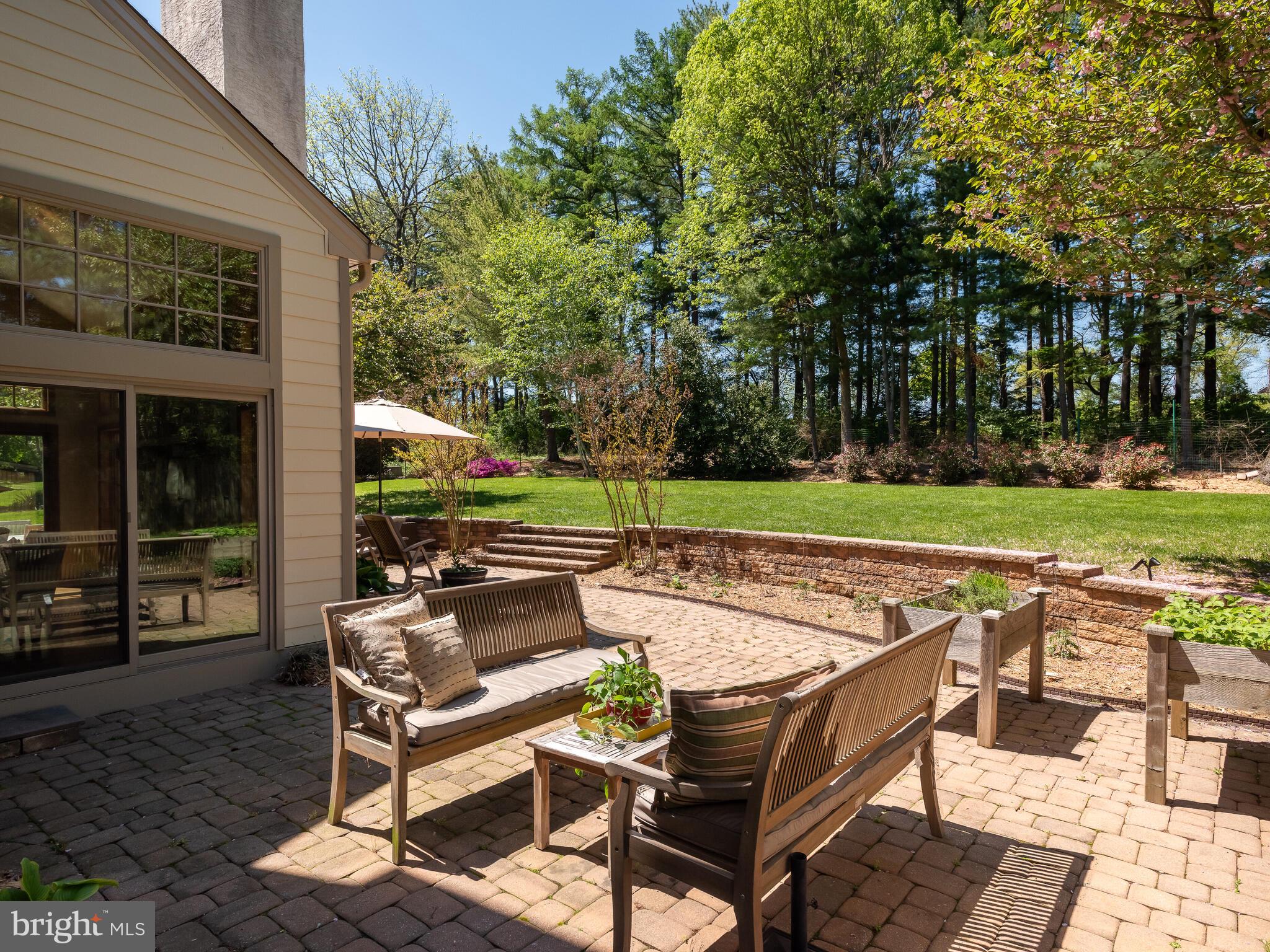 673 Thomas Jefferson Road Wayne, PA 19087 - Photo 50 of 64 a view of a backyard with sitting area