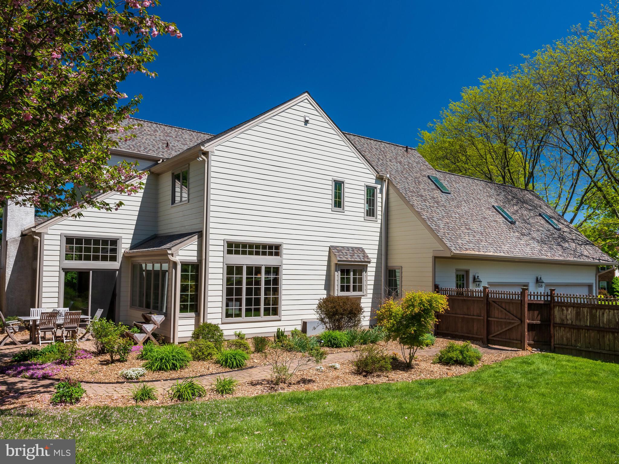 673 Thomas Jefferson Road Wayne, PA 19087 - Photo 55 of 64 a front view of a house with a yard and porch