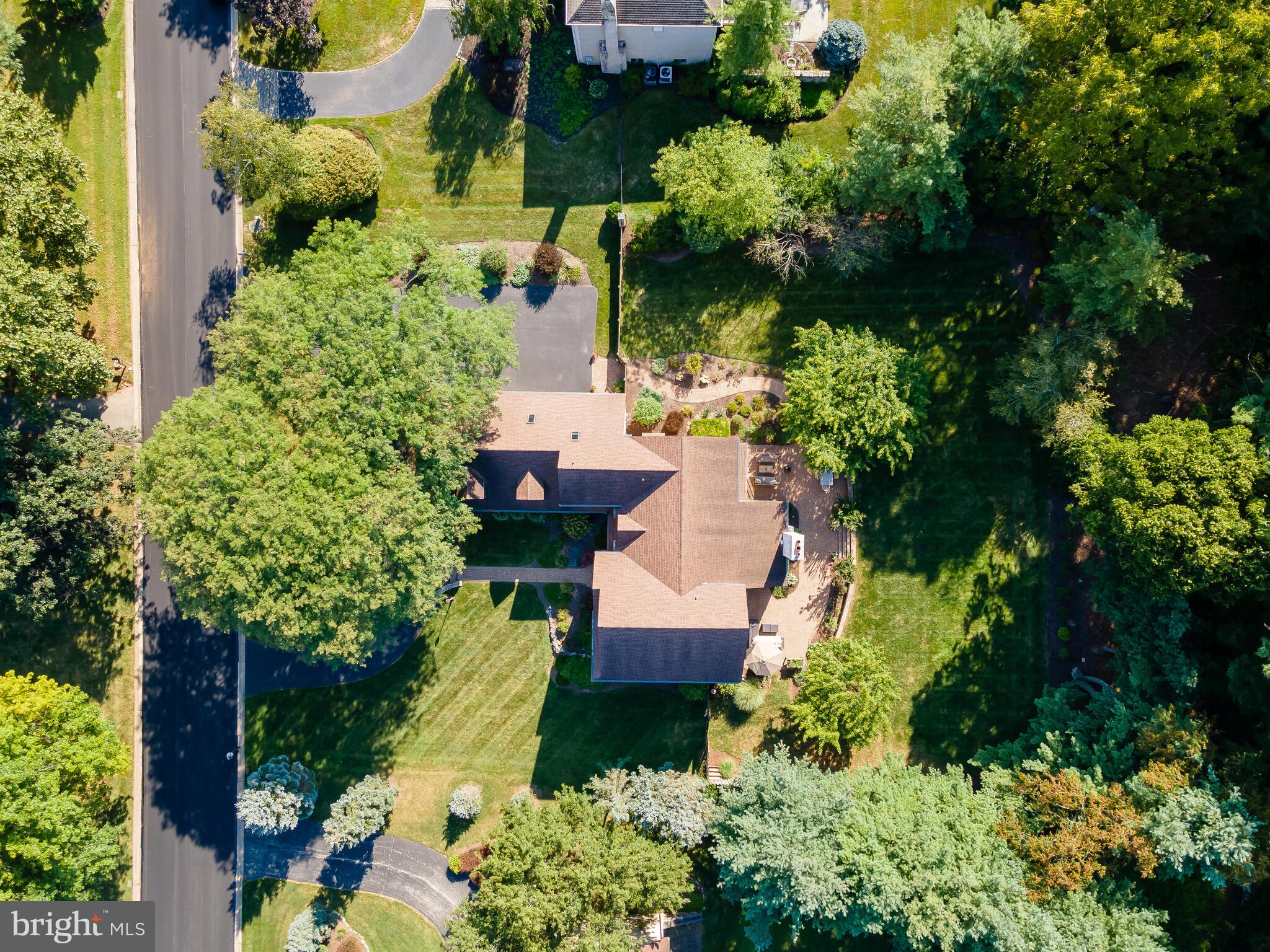 673 Thomas Jefferson Road Wayne, PA 19087 - Photo 59 of 64 an aerial view of a house with a yard and garden