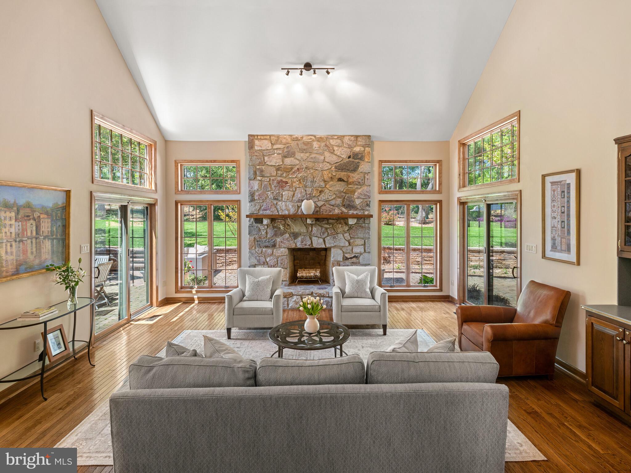 673 Thomas Jefferson Road Wayne, PA 19087 - Photo 9 of 64 a living room with furniture large window and outer view