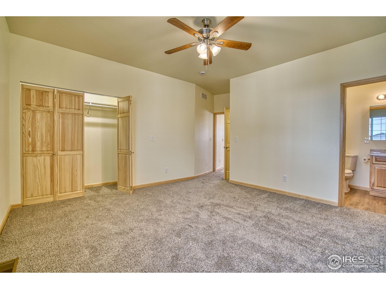 126 2nd Street Mead, CO 80542 - Photo 14 of 22 a view of an empty room with a chandelier fan