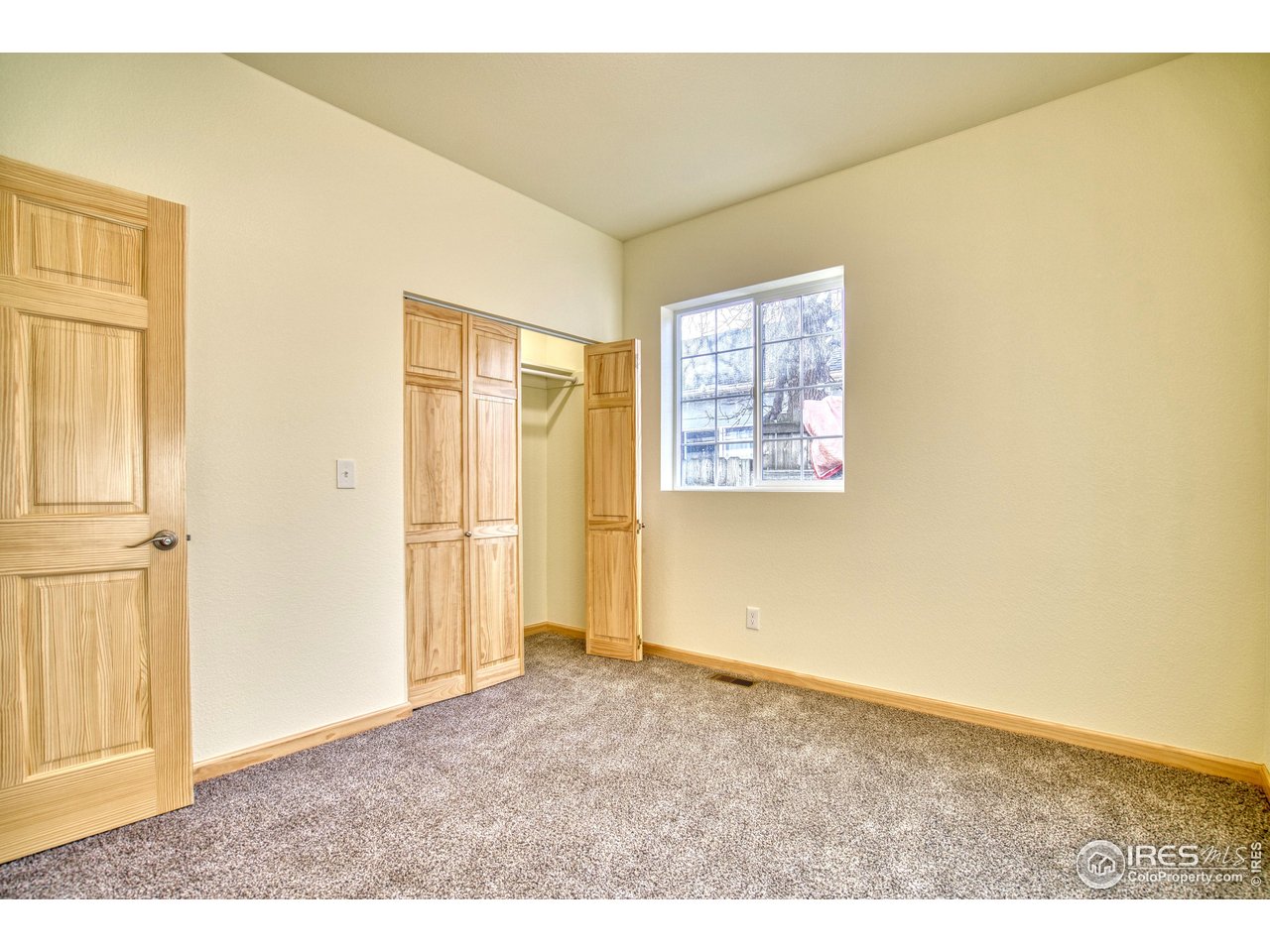 126 2nd Street Mead, CO 80542 - Photo 15 of 22 an empty room with windows