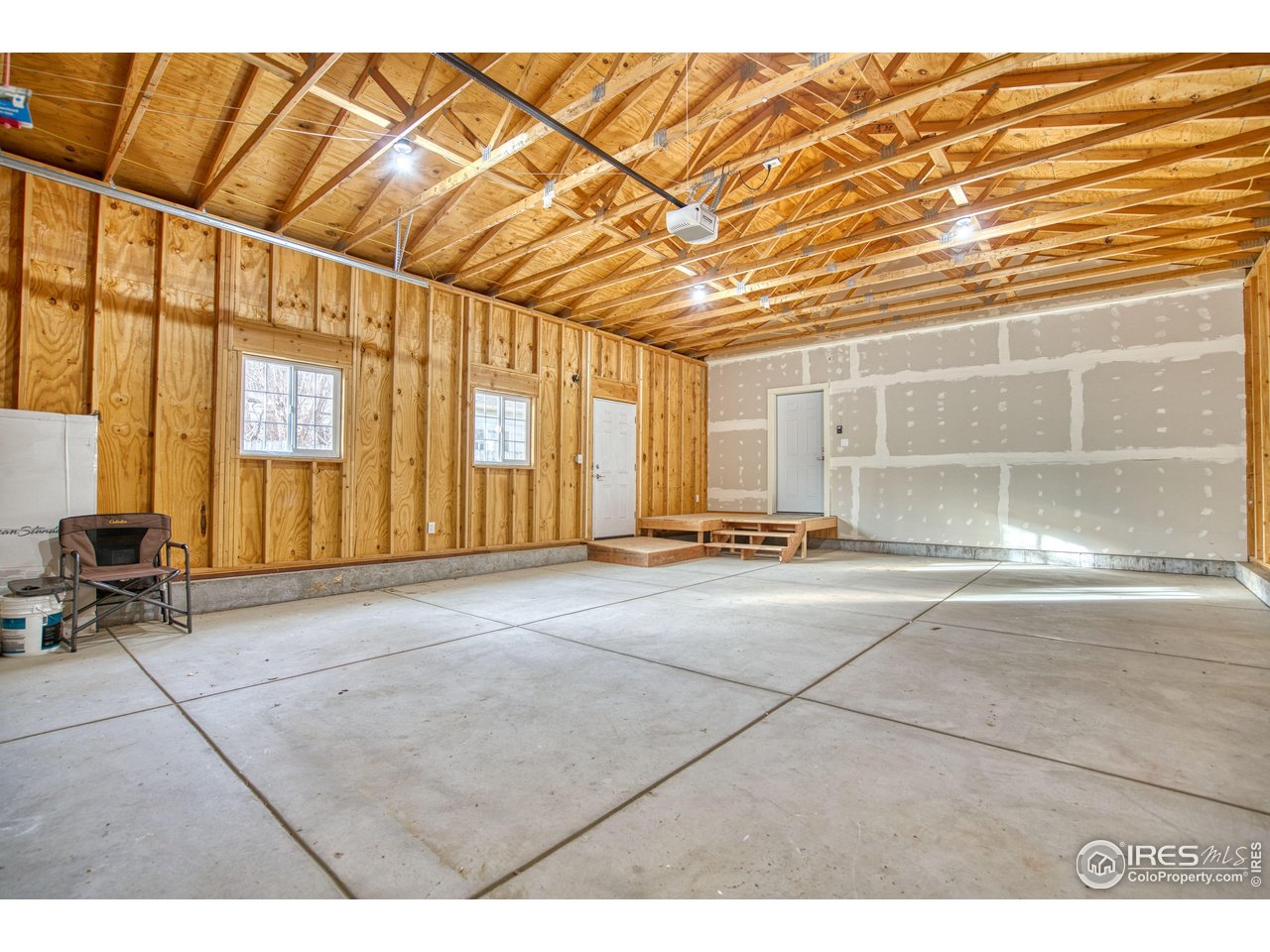 126 2nd Street Mead, CO 80542 - Photo 20 of 22 a view of an empty room with a window