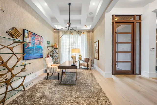 an aerial view of multiple houses with yard