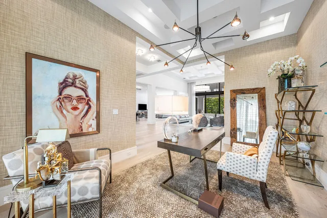 an aerial view of a house with a garden