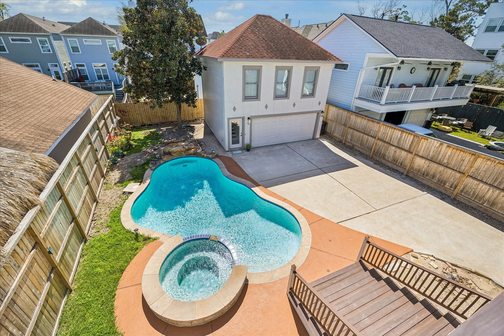 1408 West 23rd Street Houston, TX 77008 - Photo 6 of 40 An aeriel view of this lovely backyard featuring the heated pool, spa, and detached garage apartment offering approximately 620 sqft of additional living space.