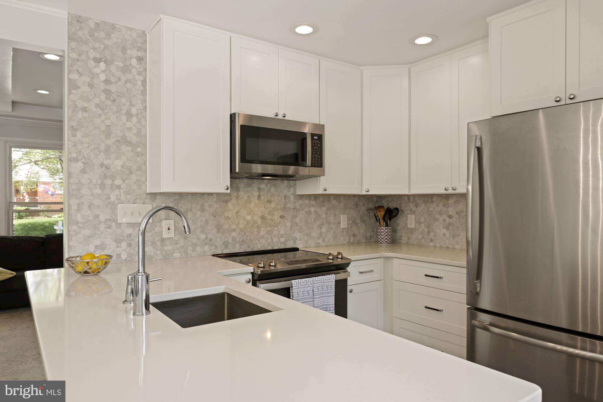 10503 Insley Street Silver Spring, MD 20902 - Photo 16 of 58 New stainless steel appliances & quartz countertop