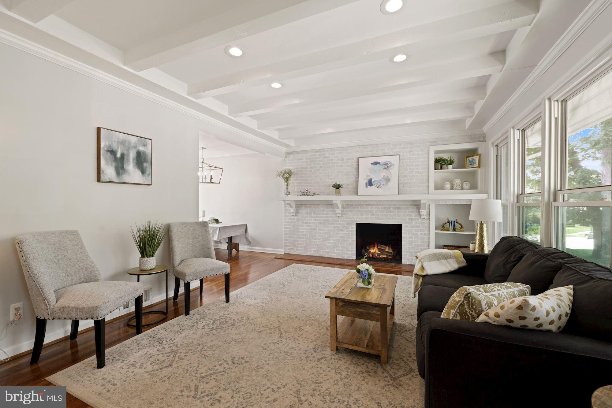 10503 Insley Street Silver Spring, MD 20902 - Photo 4 of 58 LR w/ woodburning FP, beam ceilings & rec. lights