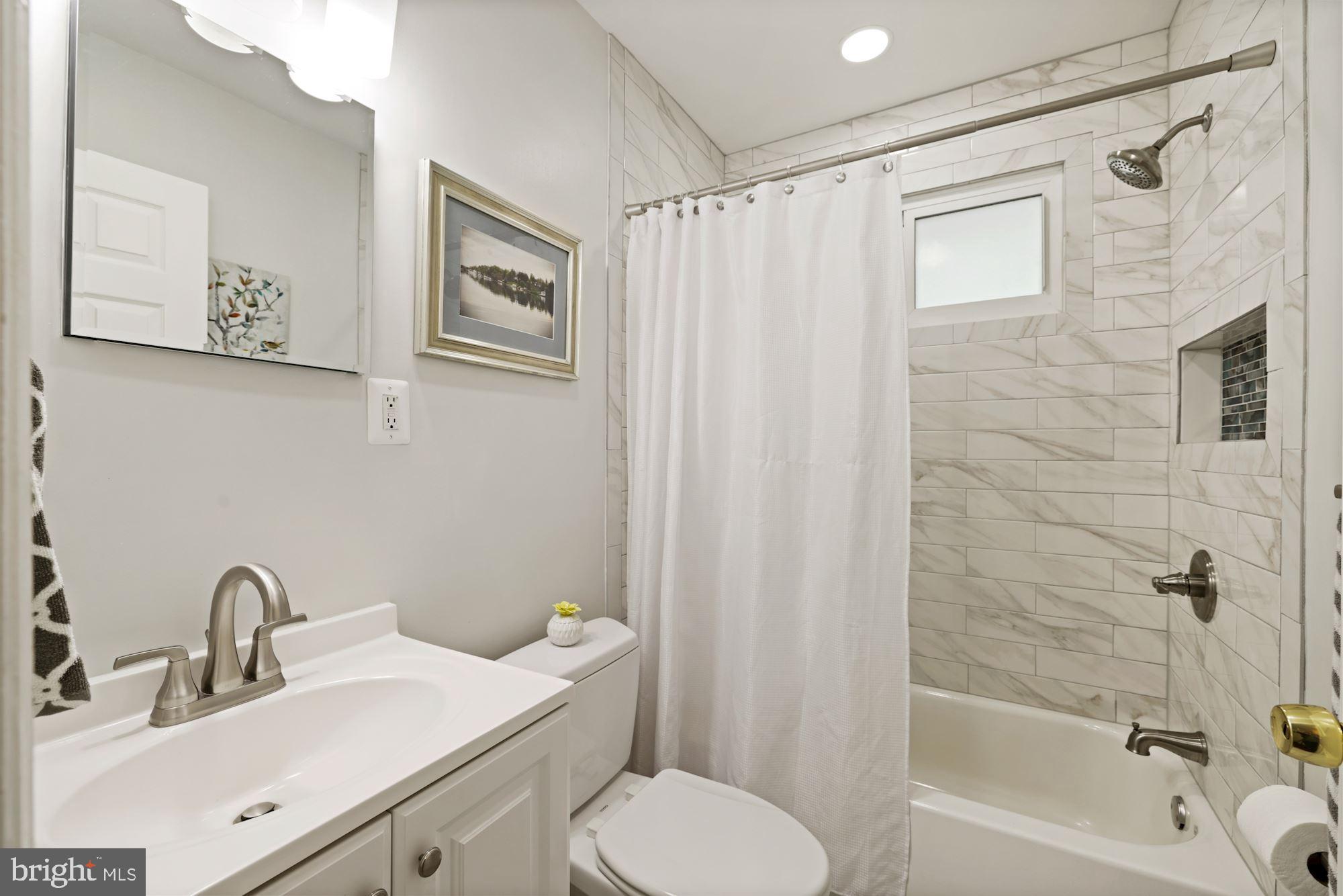 10503 Insley Street Silver Spring, MD 20902 - Photo 32 of 58 Recently renovated first floor hall bathroom