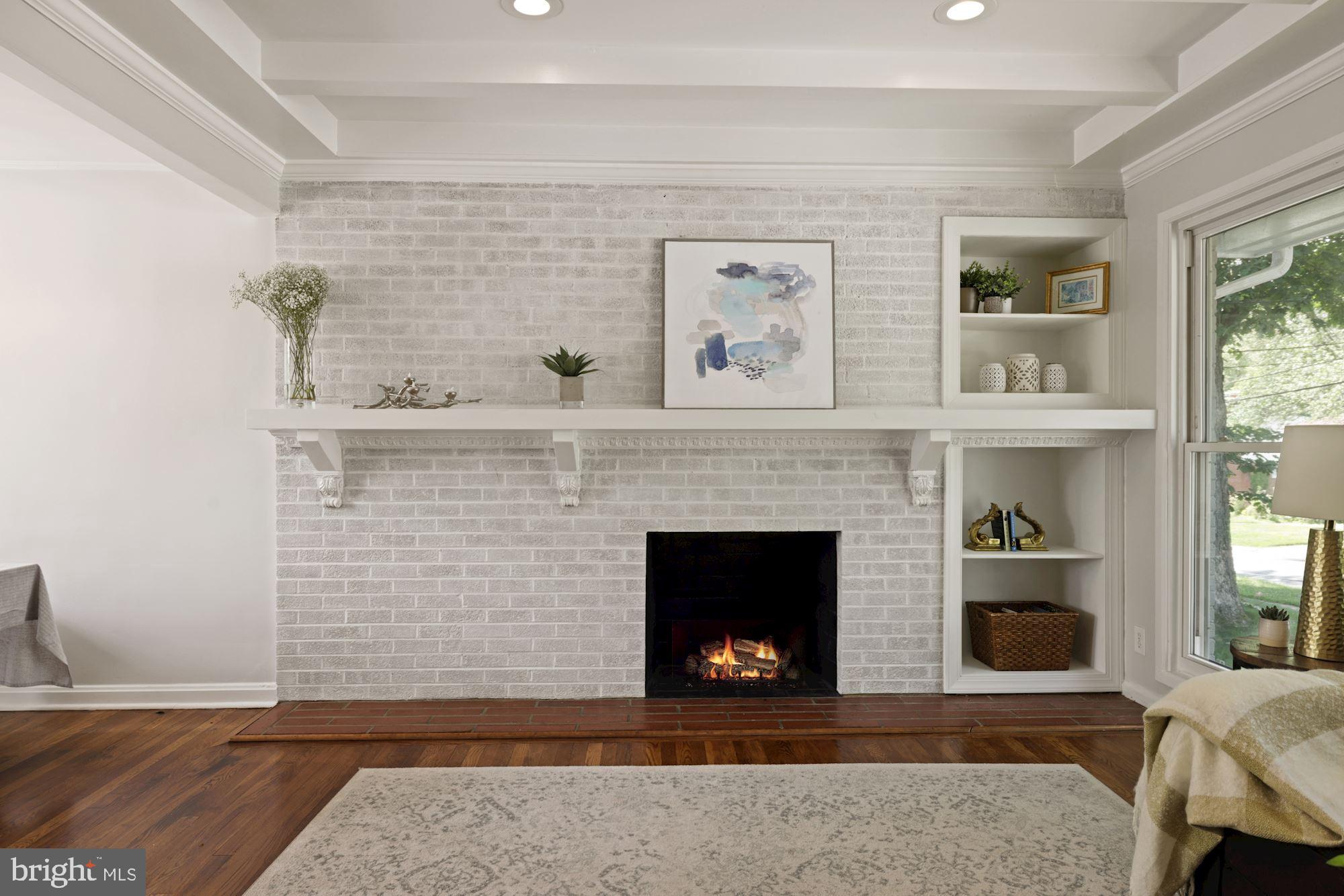 10503 Insley Street Silver Spring, MD 20902 - Photo 7 of 58 Whitewashed painted brick accent wall w/ FP