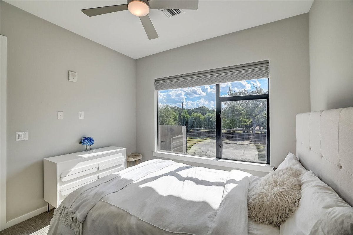 5921 Hiline Road, Unit 1204 Austin, TX 78734 - Photo 19 of 36 Bedroom featuring ceiling fan and carpet