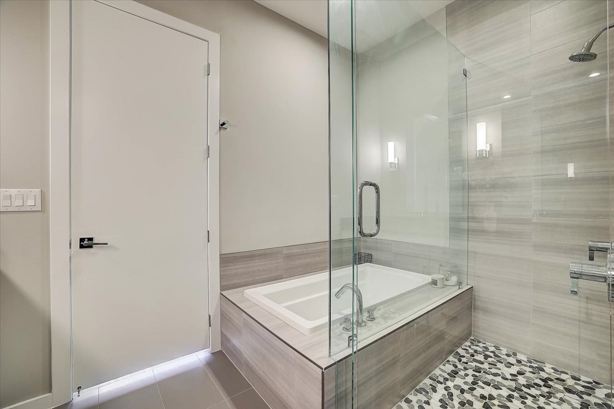 5921 Hiline Road, Unit 1204 Austin, TX 78734 - Photo 32 of 36 Full bath featuring a stall shower, a bath, and tile patterned floors
