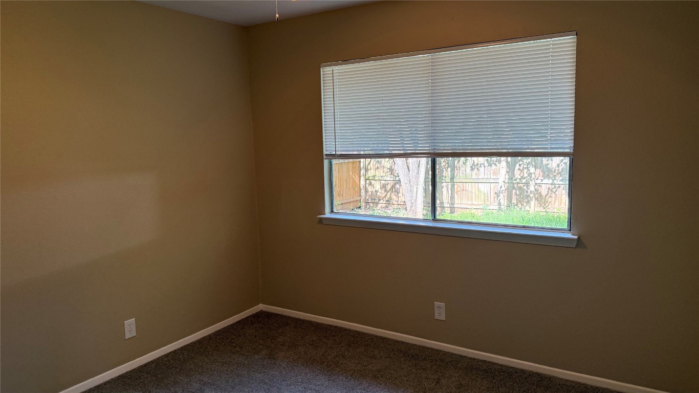 10400 Burmaster Lane, Unit A Austin, TX 78750 - Photo 14 of 20 an empty room with a window