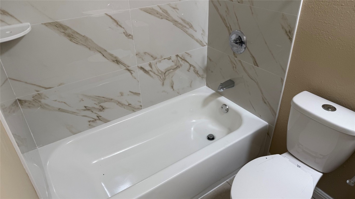 10400 Burmaster Lane, Unit A Austin, TX 78750 - Photo 16 of 20 a bathroom with a sink and toilet