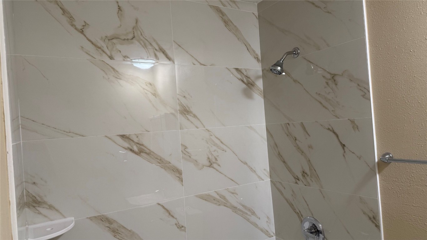 10400 Burmaster Lane, Unit A Austin, TX 78750 - Photo 17 of 20 a bathroom with a shower