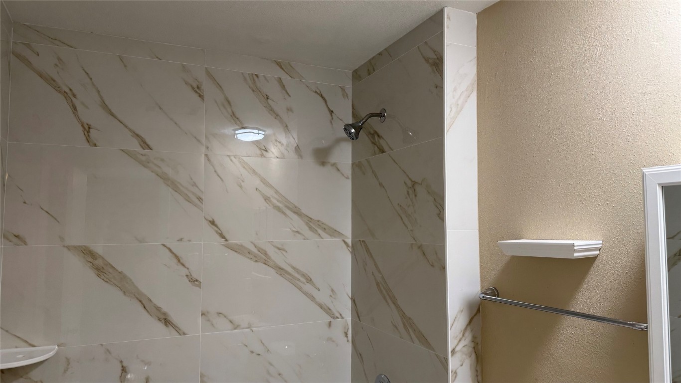 10400 Burmaster Lane, Unit A Austin, TX 78750 - Photo 10 of 20 a bathroom with a shower