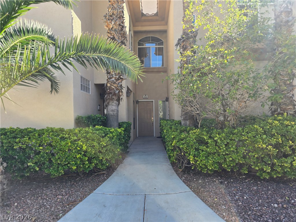 2050 West Warm Springs Road, Unit 2422 Henderson, NV 89014 - Photo 5 of 44 This charming residence features lush landscaping and a welcoming entrance.