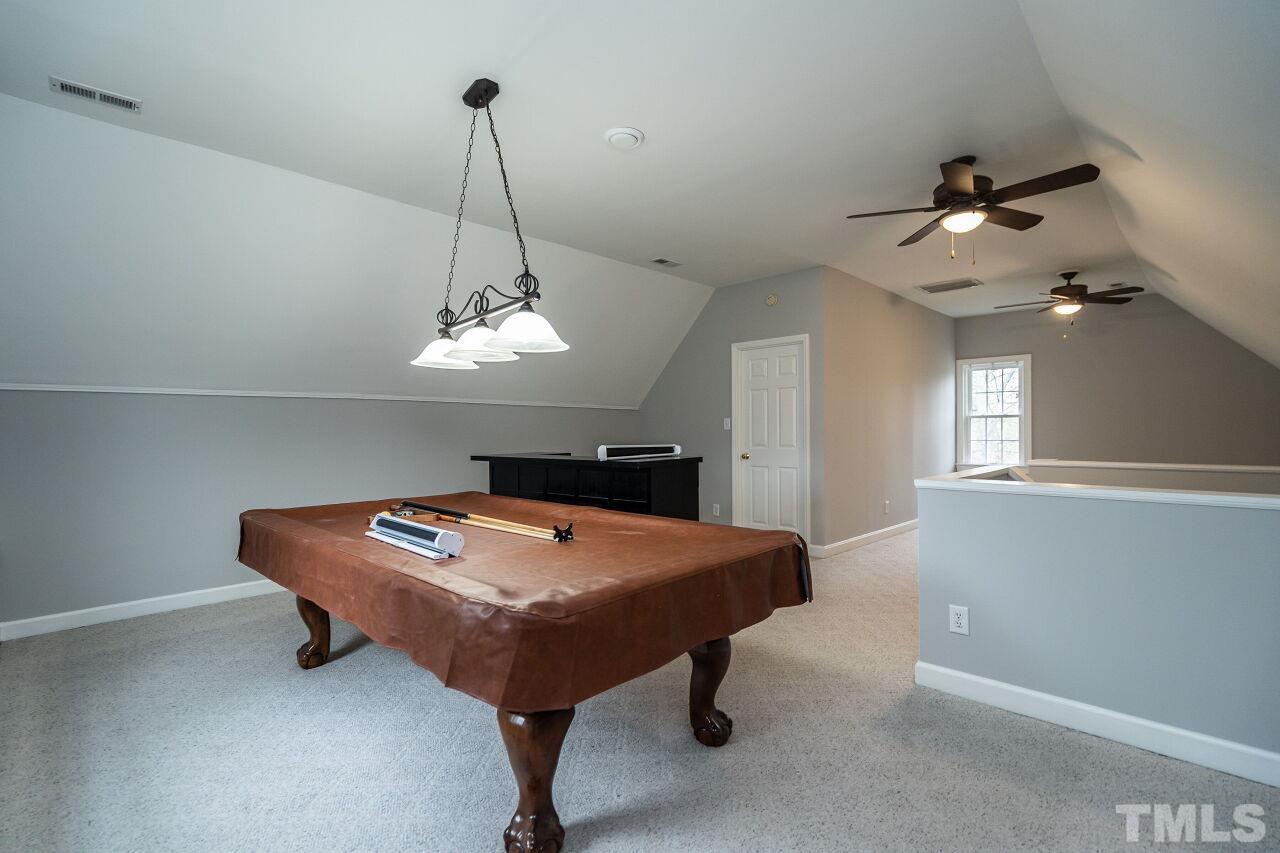 107 Needle Park Drive Cary, NC 27513 - Photo 22 of 29 a room with pool table and wooden floor