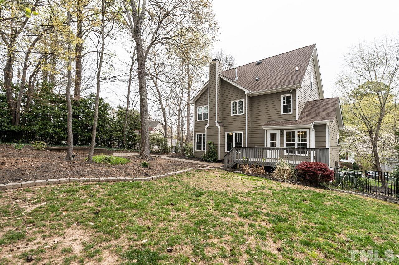 107 Needle Park Drive Cary, NC 27513 - Photo 28 of 29 a front view of house with yard and trees