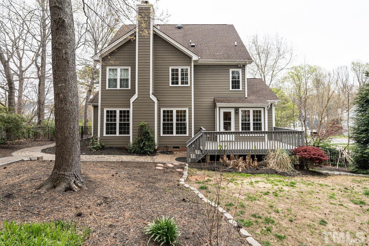 107 Needle Park Drive Cary, NC 27513 - Photo 29 of 29 a front view of a house with yard covered in snow