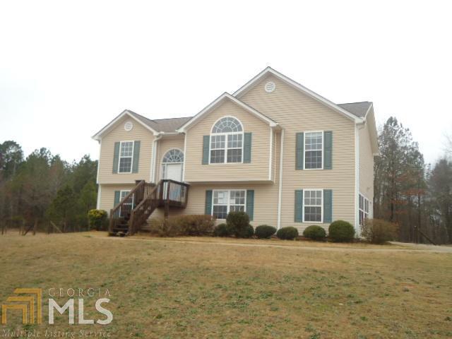 92 Macedonia Road Newnan, GA 30263 - Photo 1 of 1 a front view of a house with a yard