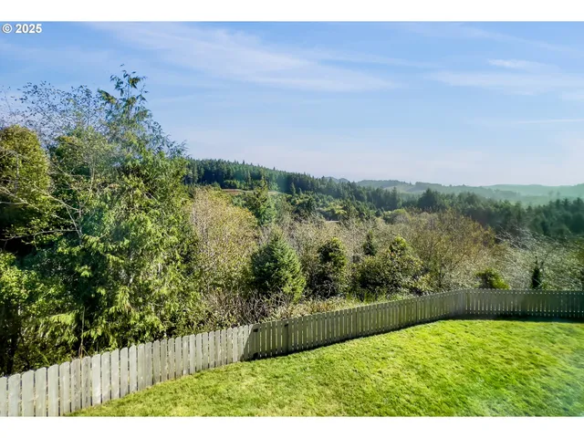 a view of a yard with an outdoor seating
