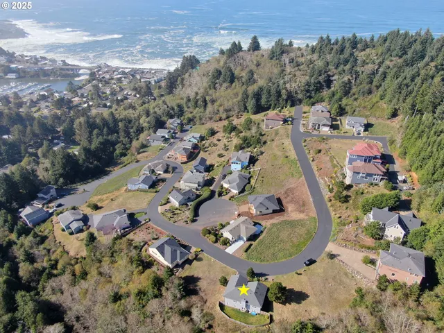 an aerial view of a swimming pool and mountain view
