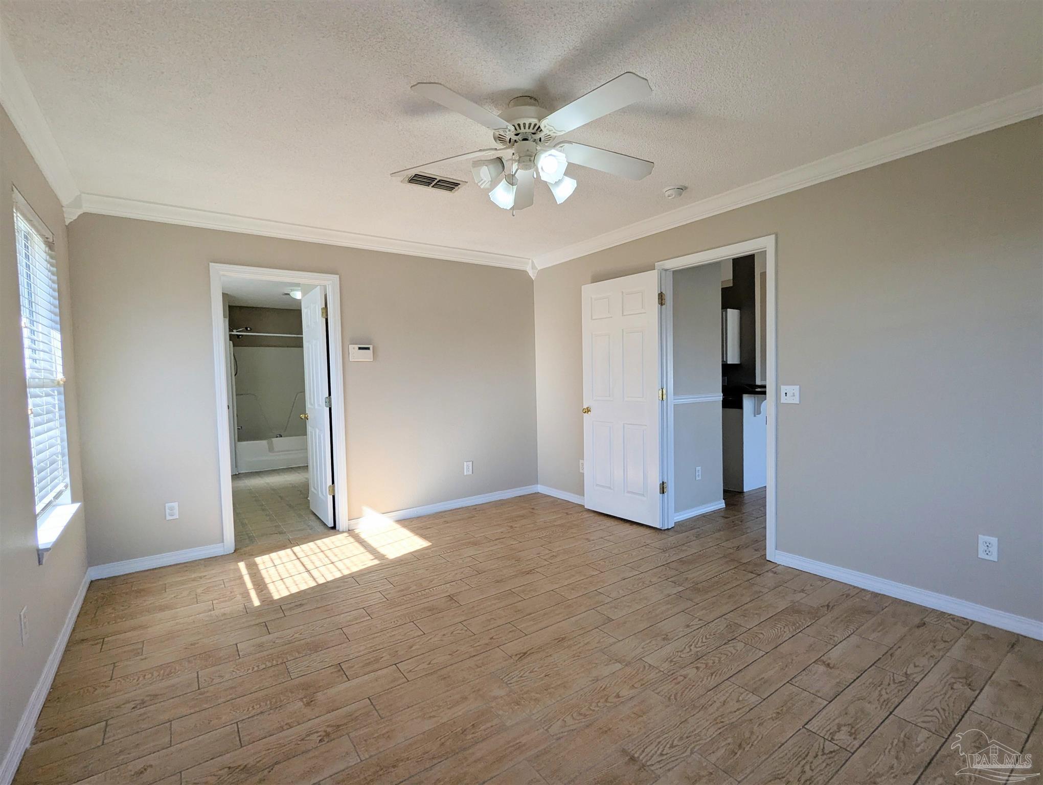 7108 Fitzpatrick Road Pensacola, FL 32526 - Photo 16 of 30 a view of an empty room with a window