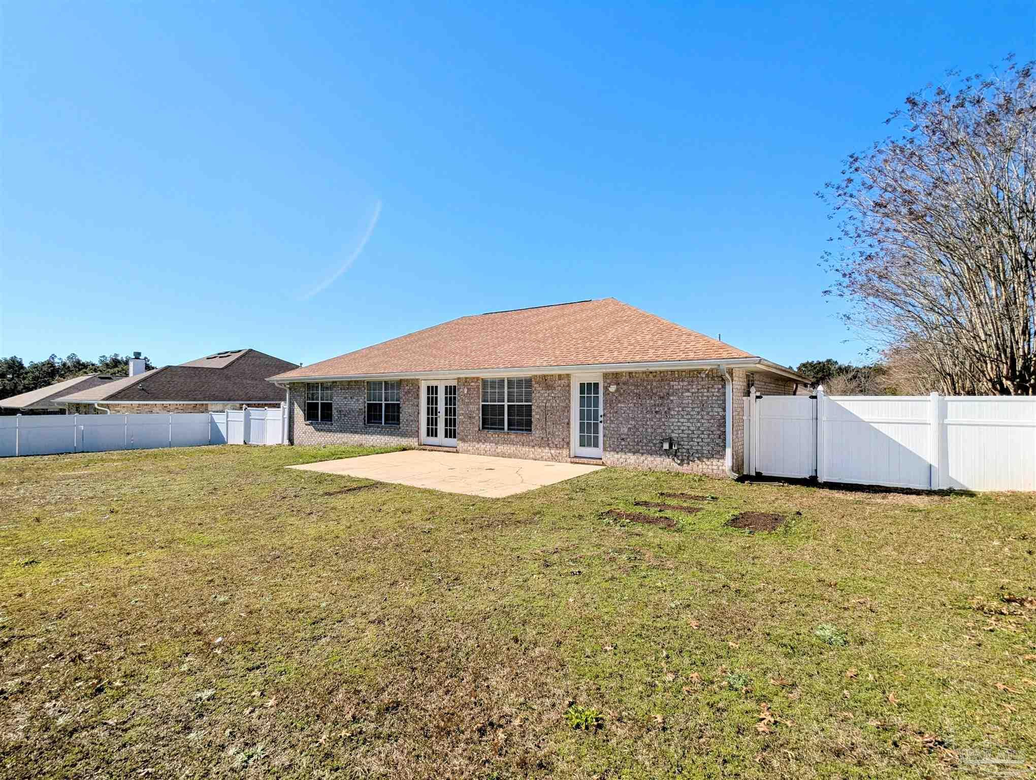7108 Fitzpatrick Road Pensacola, FL 32526 - Photo 29 of 30 a house with swimming pool in front of it
