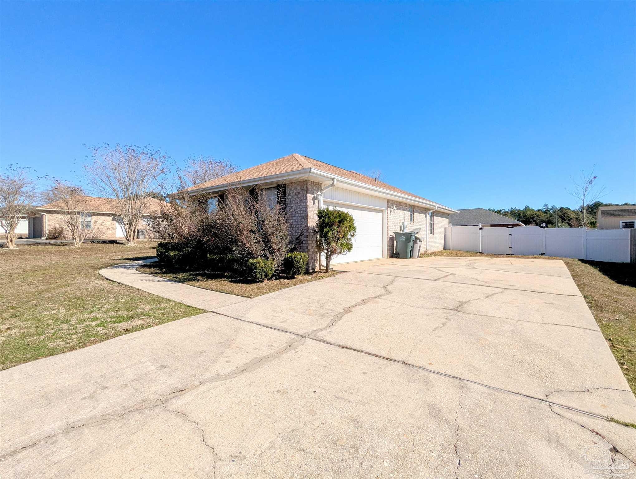 7108 Fitzpatrick Road Pensacola, FL 32526 - Photo 30 of 30 a view of a house with a street
