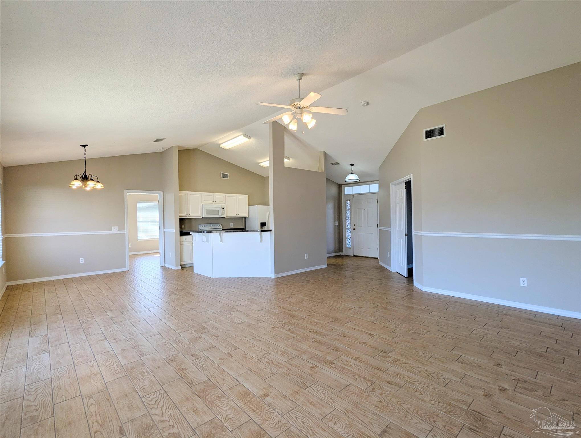 7108 Fitzpatrick Road Pensacola, FL 32526 - Photo 7 of 30 a view of a kitchen with a sink and a kitchen