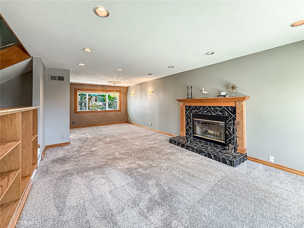 2235 Burnside Street Simi Valley, CA 93065 - Photo 15 of 71 an entryway and livingroom with fireplace