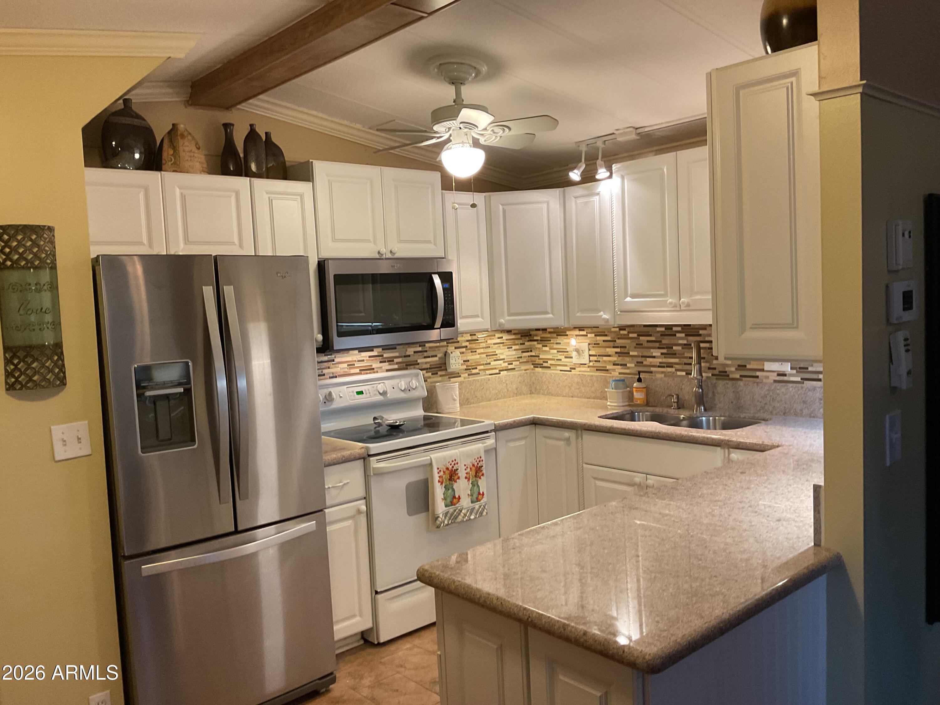 3036 East Utopia Road, Unit 52 Phoenix, AZ 85050 - Photo 5 of 36 Kitchen 1
