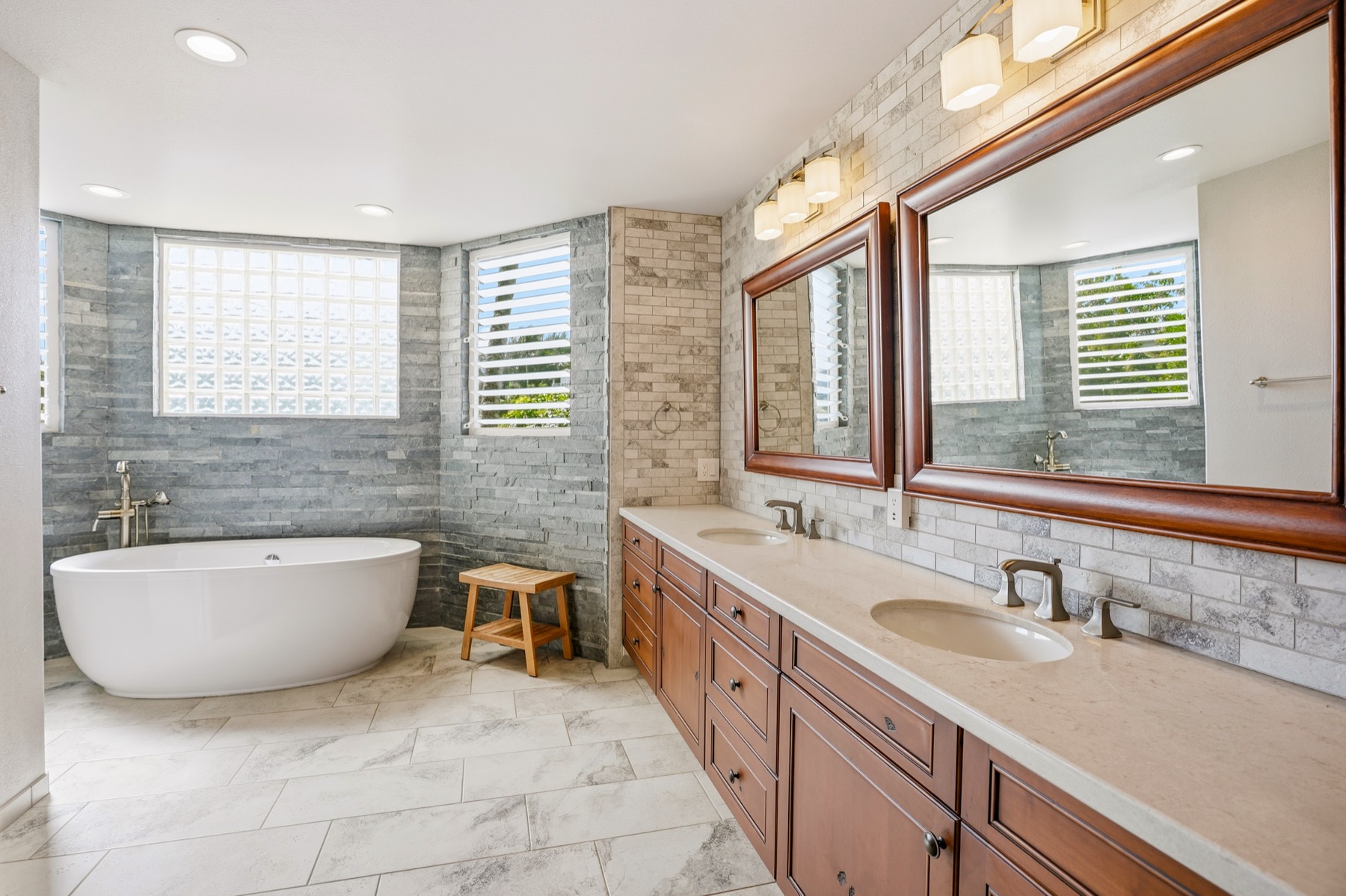 3564 Kaweonui Road Princeville, HI 96722 - Photo 11 of 30 a bathroom with a tub sink and mirror