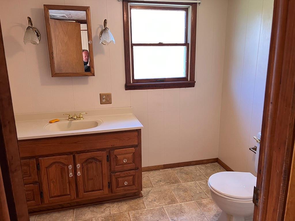 76 Cherry Run Road Homer City, PA 15748 - Photo 15 of 20 a bathroom with a toilet a sink and mirror