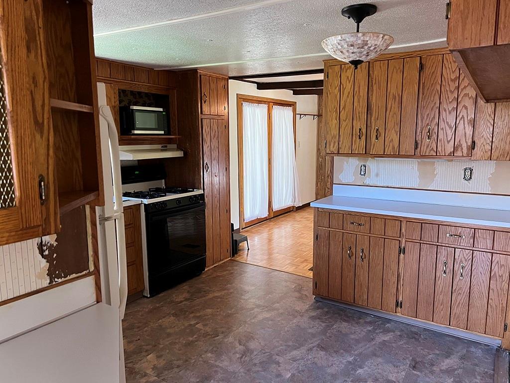 76 Cherry Run Road Homer City, PA 15748 - Photo 8 of 20 a kitchen with stainless steel appliances a refrigerator and a stove top oven
