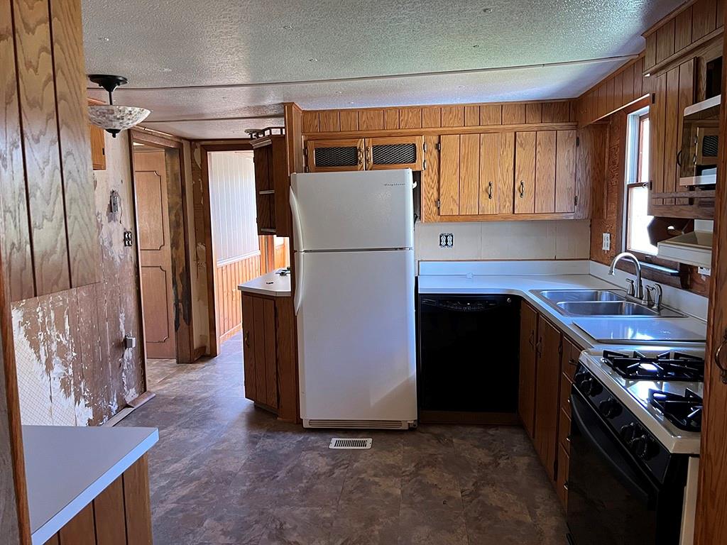 76 Cherry Run Road Homer City, PA 15748 - Photo 9 of 20 a kitchen with stainless steel appliances granite countertop a refrigerator and a stove