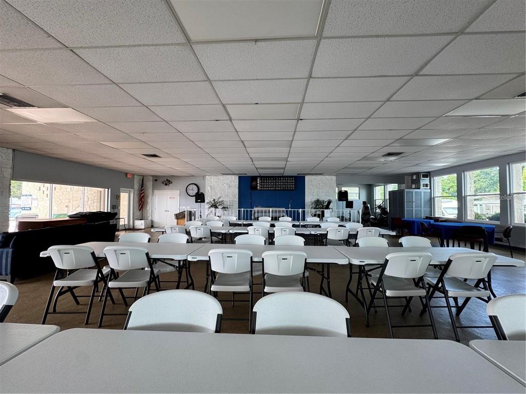 250 Rosery Road Northwest, Unit 283 Largo, FL 33770 - Photo 21 of 23 a group of people sitting at living room