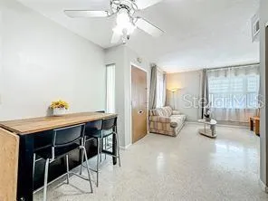 a view of a livingroom with furniture and window