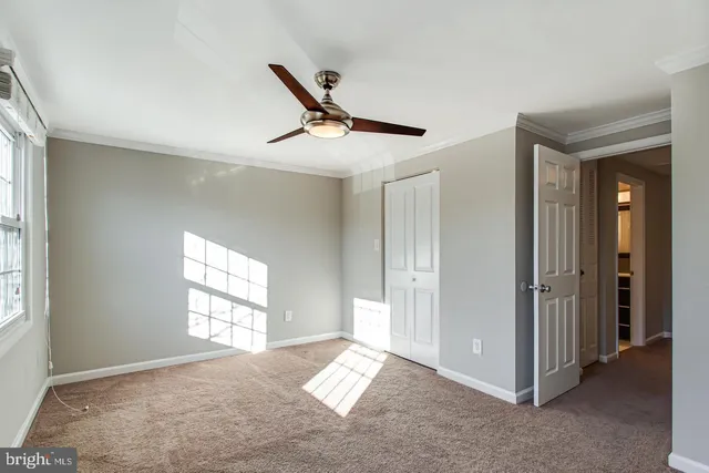 a view of empty room with windows
