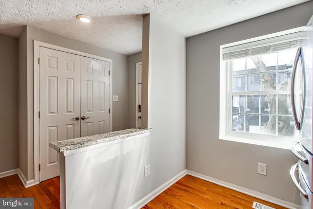 a room with a bed and a window