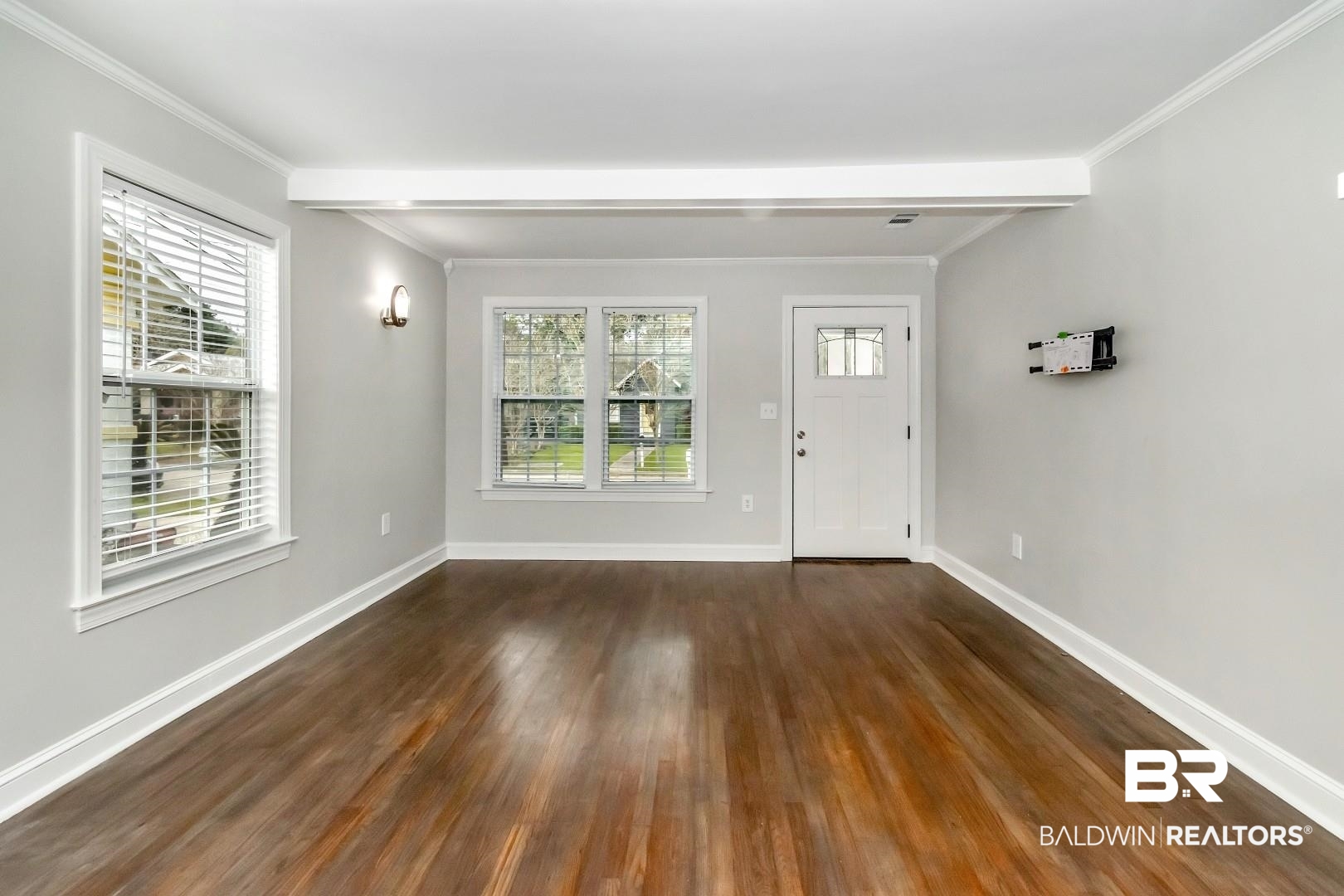 2157 Homewood Street Mobile, AL 36606 - Photo 4 of 36 Entrance foyer with a healthy amount of sunlight, dark wood finished floors, and baseboards