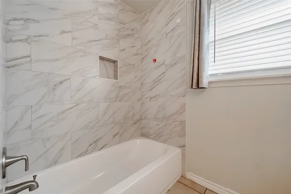 a bathroom with a bathtub